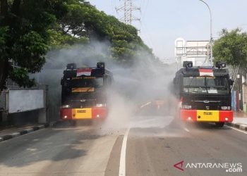 Brimob Polda Metro lakukan disinfeksi jalur protokol