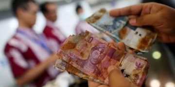 Cara dan Syarat Tukar Uang Rupiah yang Sobek dan Uang Logam