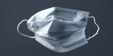 Masyarakat Wajib Gunting Tali Masker Sekali Pakai Sebelum Dibuang