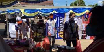 Prokes Saat UMKM Pamerkan Produk Masyarakat Merauke di Tengah Penyelenggaraan PON XX Papua