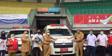PEMKOT BEKASI SERAHKAN BANTUAN MOBIL DAN MOTOR AMBULANS
