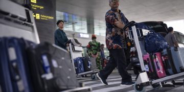 Foto : Salah satu penumpang arus balik Bandara Dhoho (Tim)