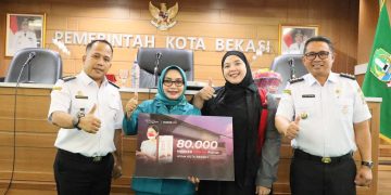 PKK Kota Bekasi Bagikan 80.000 Masker untuk Warga Kota Bekasi, Antisipasi Dampak Abu Vulkanik